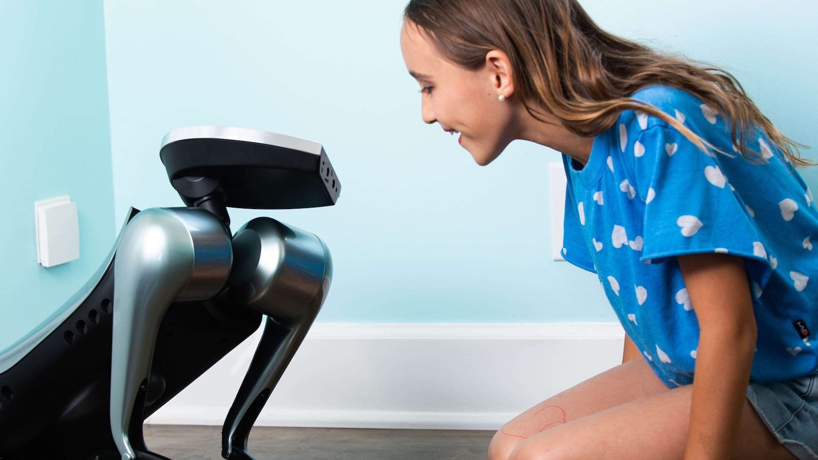 KODA AI robot dog interacts socially with its owners
