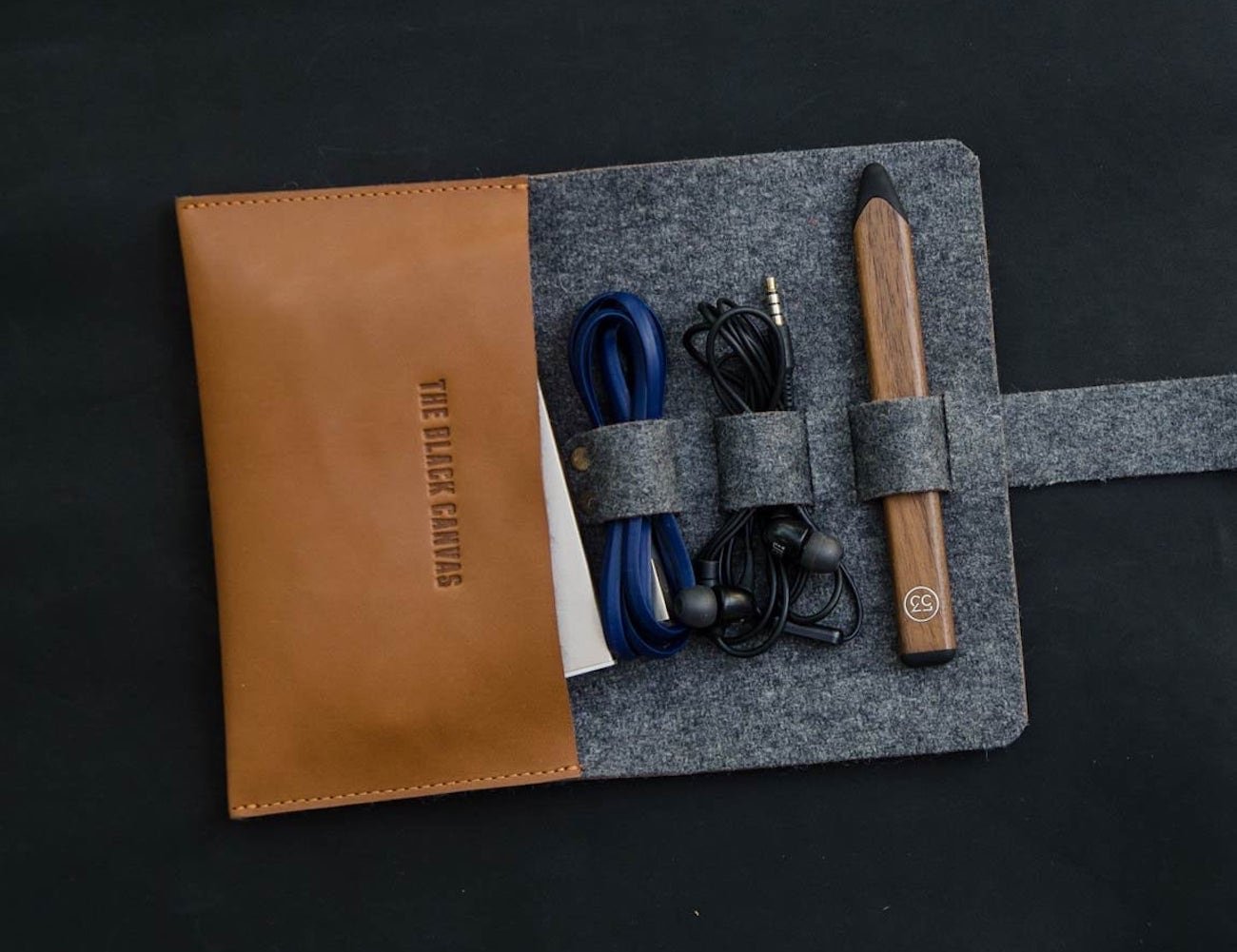 The Black Canvas leather & felt USB cable organizer makes for easy carrying