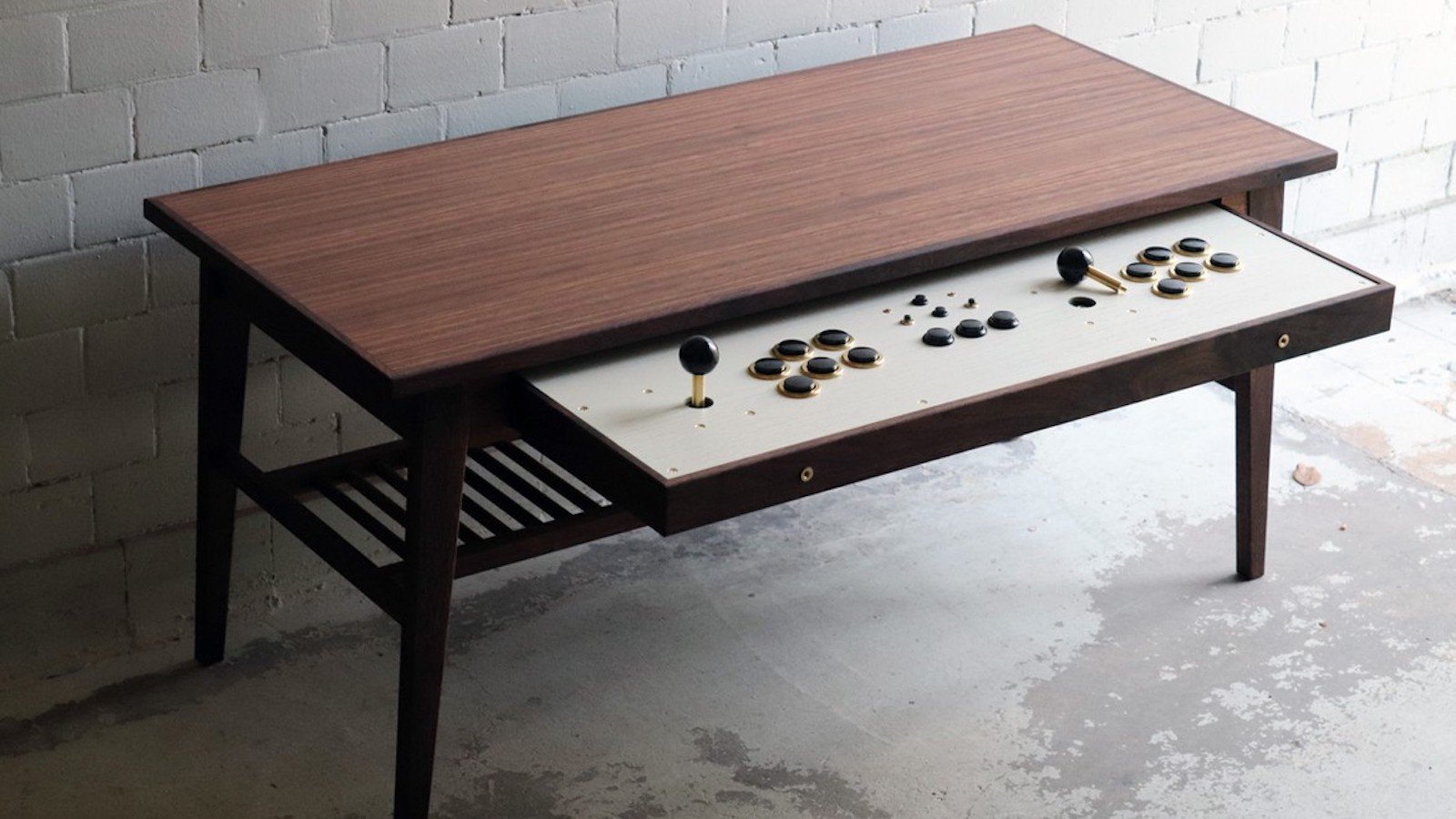 Love Hulten Coffee Table Retro Gamer Desk has a pull-out drawer with two full arcade stick set-ups