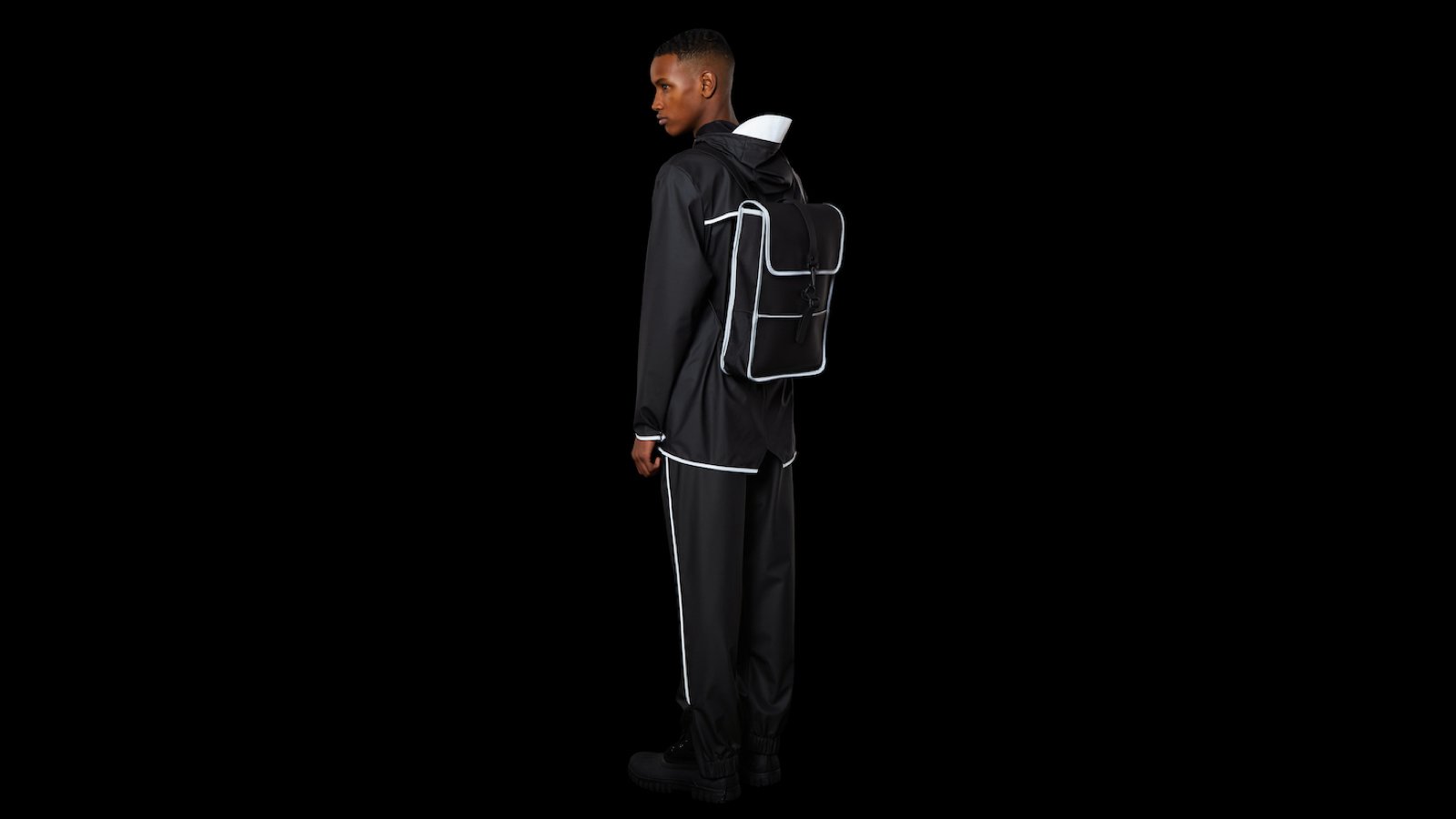 Rains Backpack Mini sleek laptop backpack boasts clean lines and holds a 15″ laptop