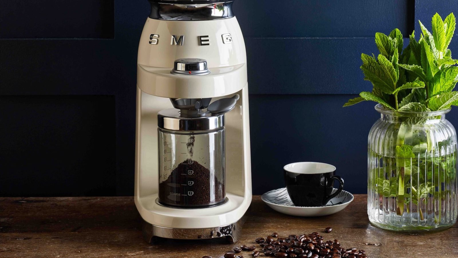 Smeg CGF01 Coffee Grinder adds a sleek look to your kitchen & offers high-quality grinding