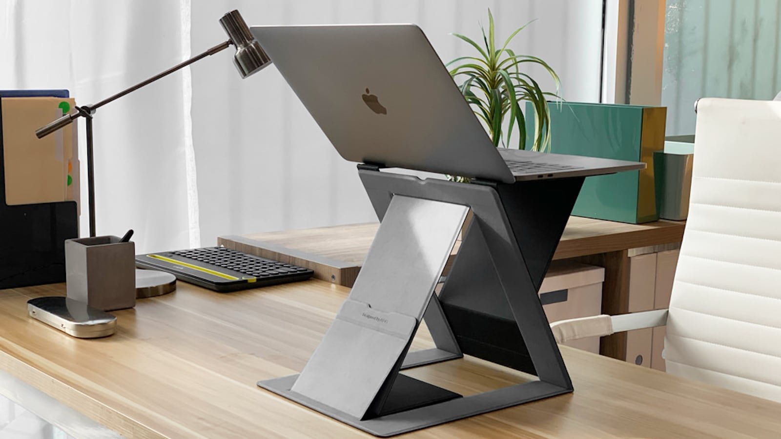 MOFT Z 4-in-1 Invisible Sit-Stand Laptop Desk has an origami-inspired design