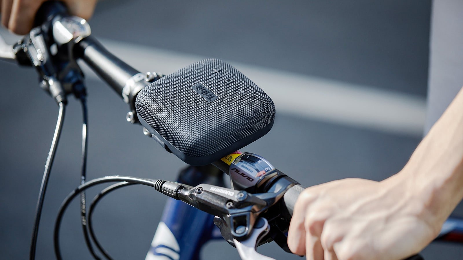 Tribit StormBox Micro speaker has a tear-resistant strap to attach it to your bike