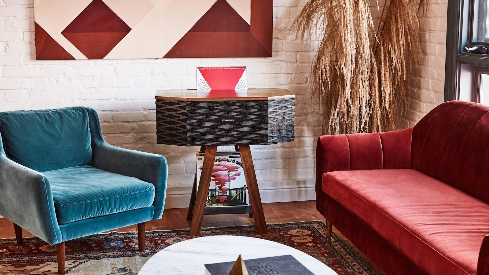 Wrensilva Loft wood record console works with Sonos speakers and can store 60 vinyl albums