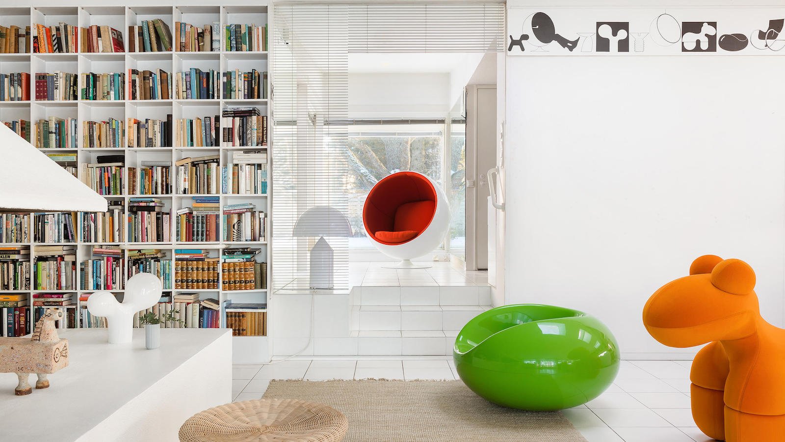 Eero Aarnio Fiberglass Ball Chair seats two people in a snug environment with no corners