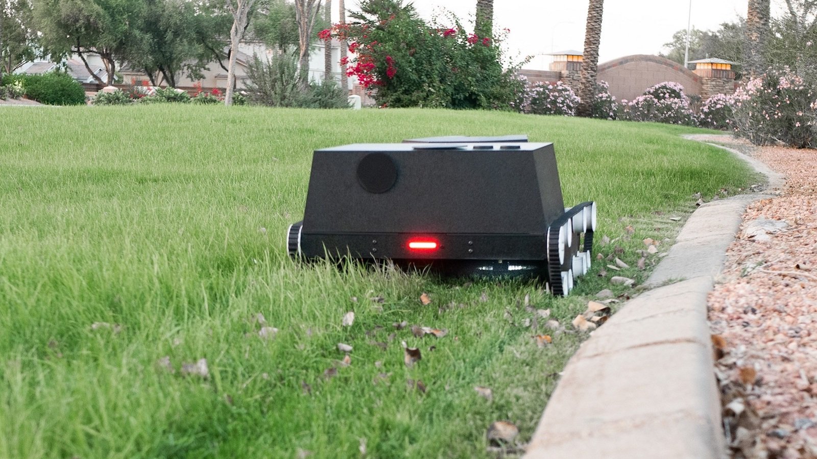 Yardroid intelligent landscaping robot mows grass, waters plants, kills weeds, and more