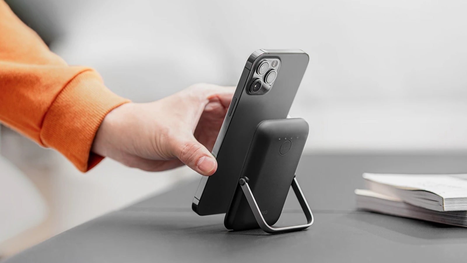 UNIQ Hoveo wireless power bank with a stand fits in your pocket & has a 5,000 mAh battery