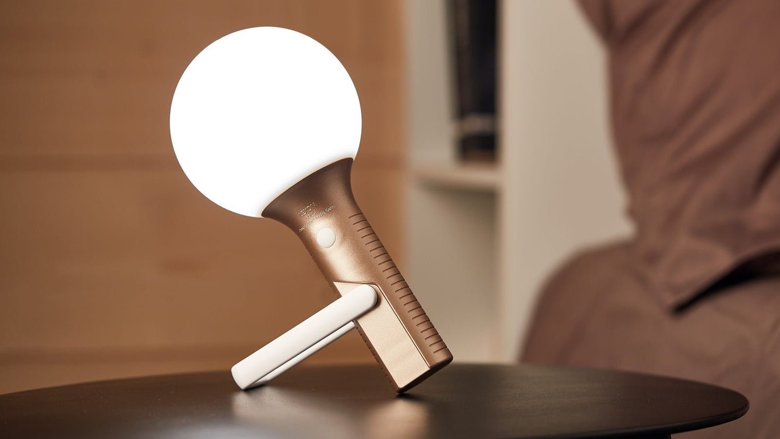 Lexon Bolla+ multi-position LED lamp can be suspended or placed using its adjustable handle