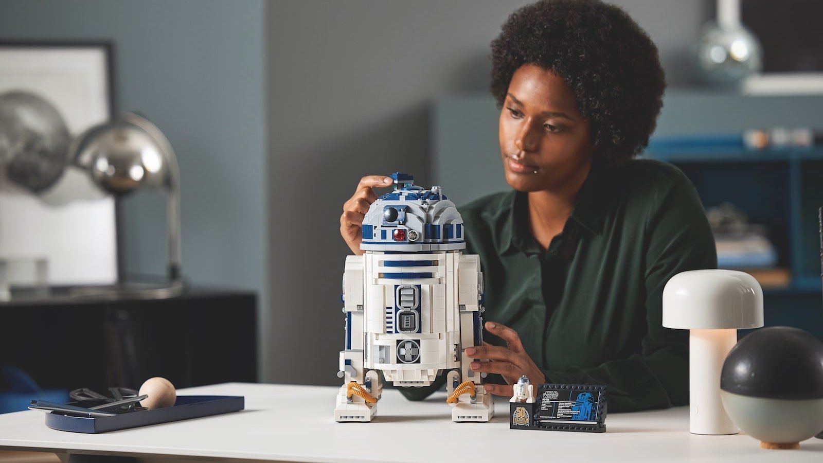 LEGO Star Wars R2-D2 construction set boasts authentic features, such as a rotating head