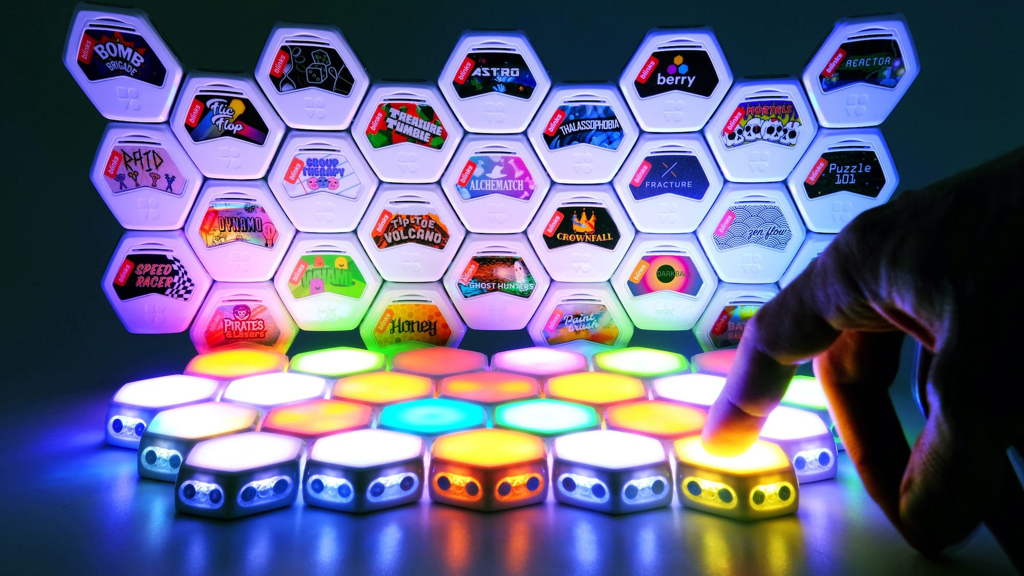 Blinks by Move38 smart tabletop game system has futuristic, touch-sensitive game pieces