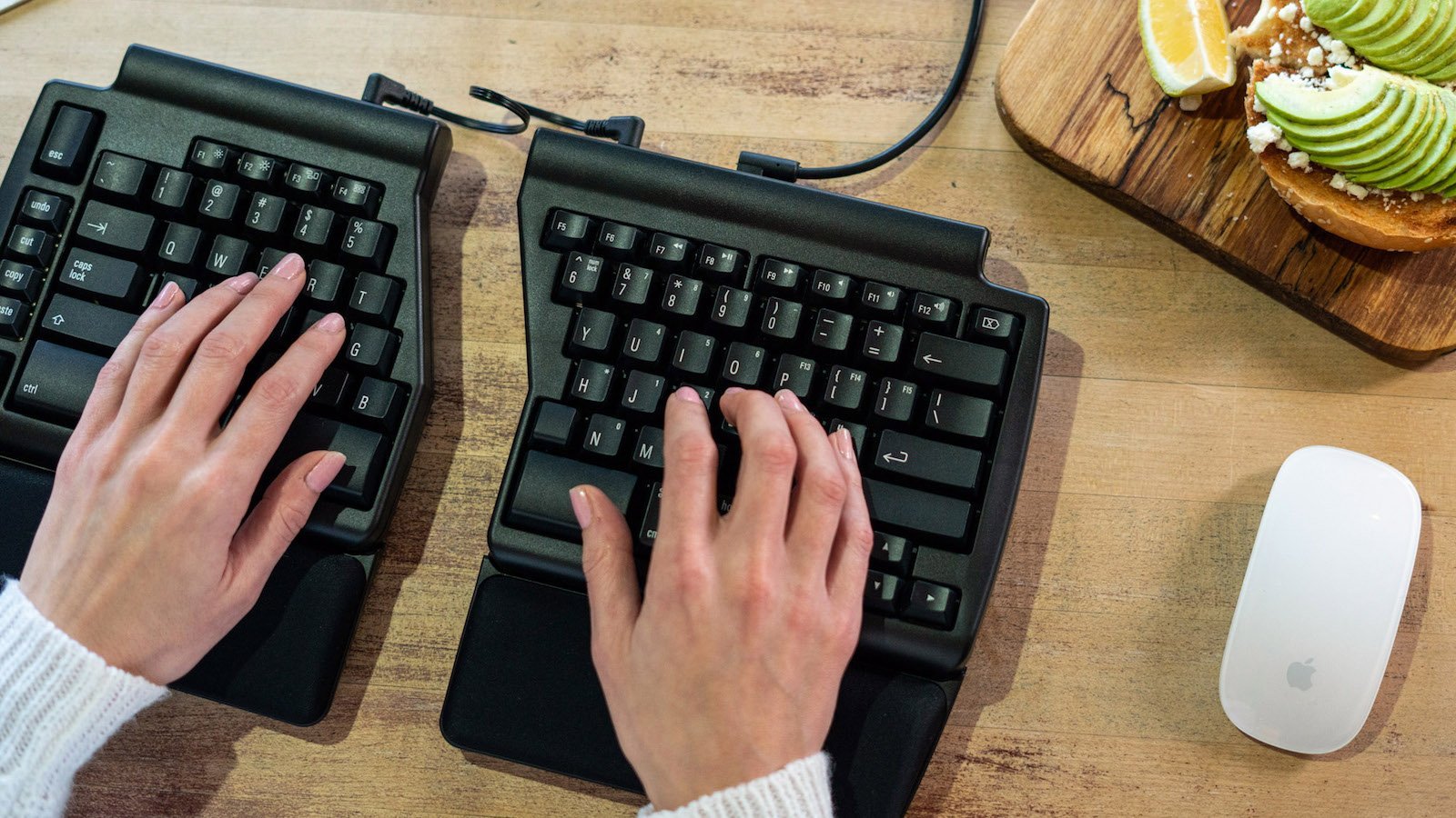 Programmable Ergo Pro ergonomic mechanical keyboard provides a range of key adjustments