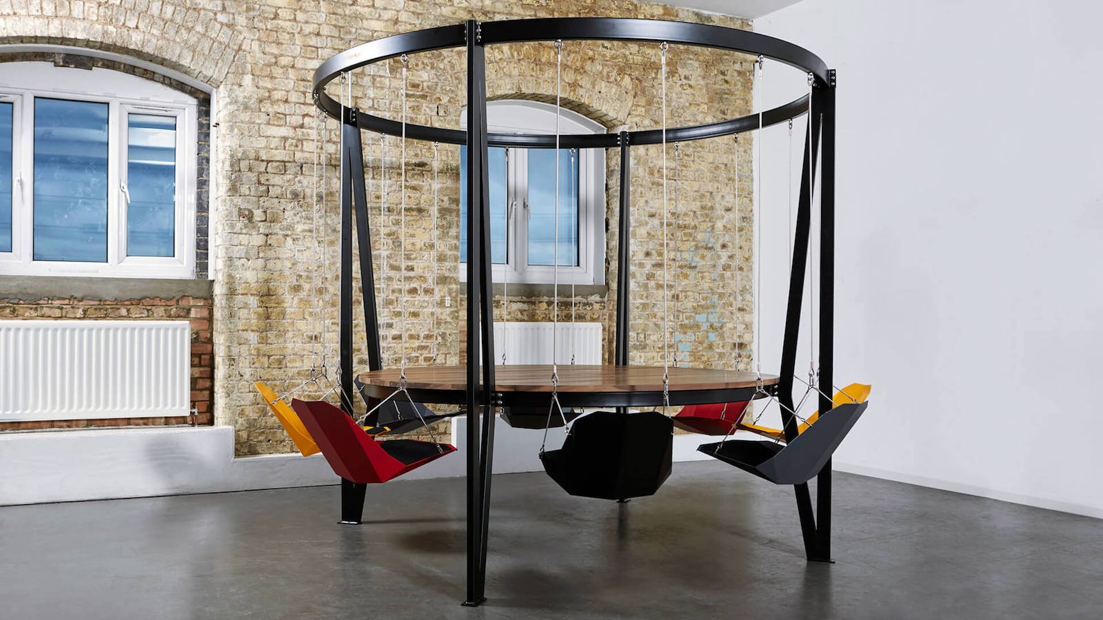 This King Arthur swinging table makes sitting more exciting