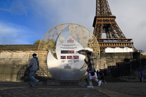 Paris Olympic organizers press ahead with ambitious opening ceremony after Macron’s comments on security concerns
