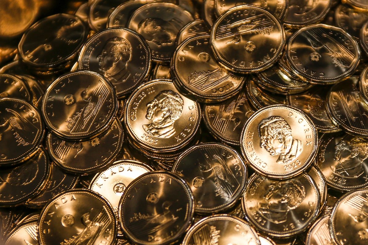 Loonie hits four-month low as stronger-than-expected economic data lifts U.S. dollar