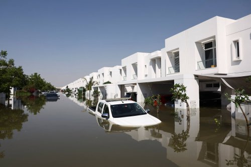 What caused the massive rainstorm in Dubai?
