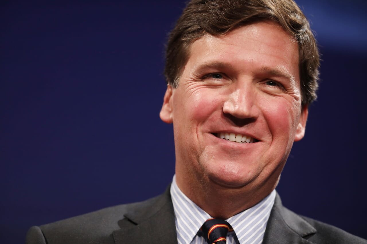 Fox News stands by Tucker Carlson after white 'replacement' theory causes outrage