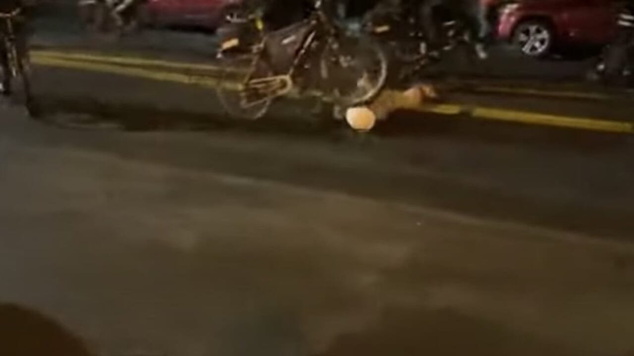 Seattle officer rolls bike over protester's head in viral video