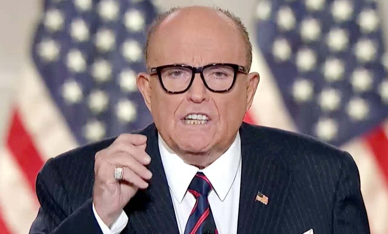 Giuliani, awaiting COVID-19 results, coughs while slamming Biden on Fox News