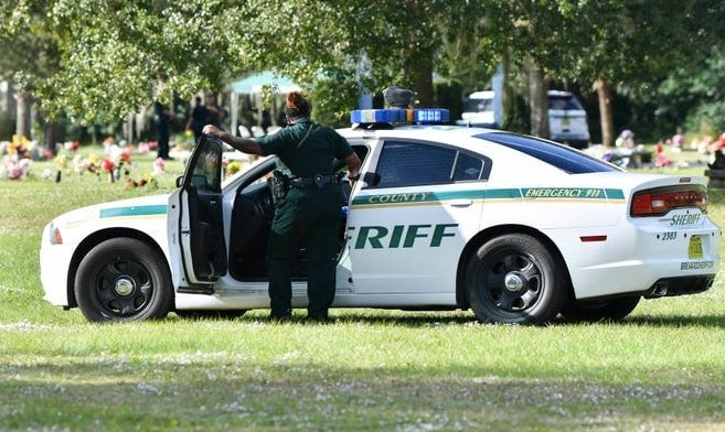 Florida mom shot at her cop-killed son's funeral service