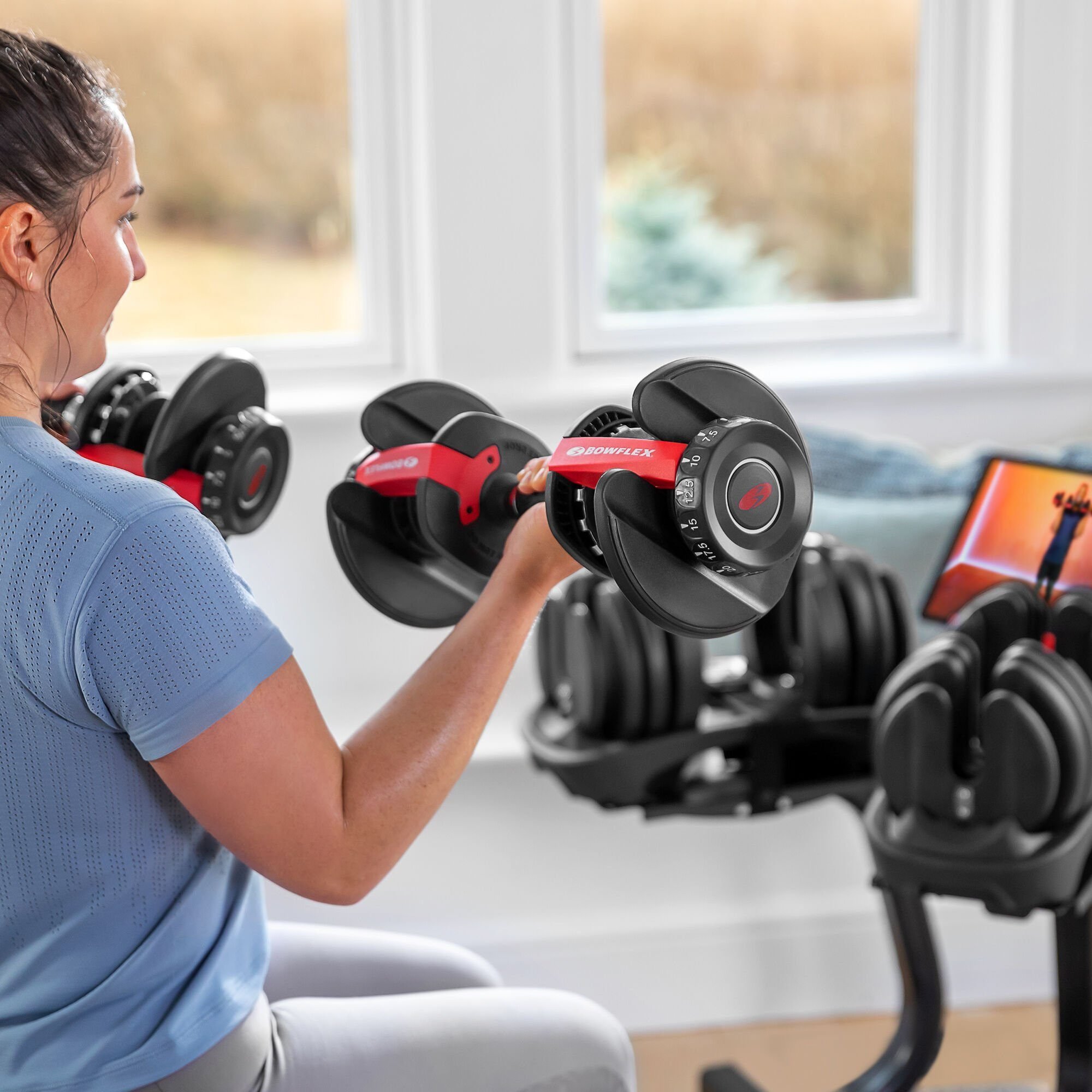 A Trainer Says These Adjustable Dumbbells Are Your “Best Investment”