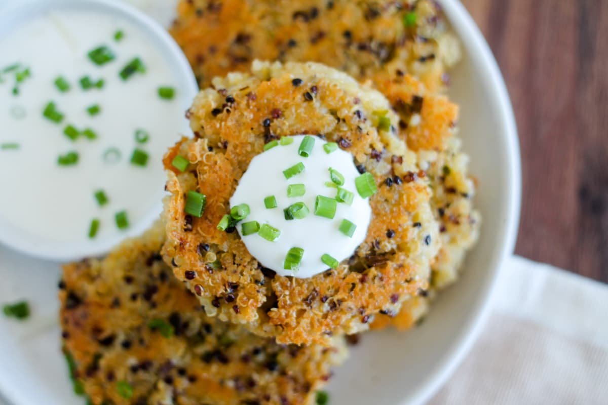 The trick that turns quinoa into golden cheesy fritters - cover