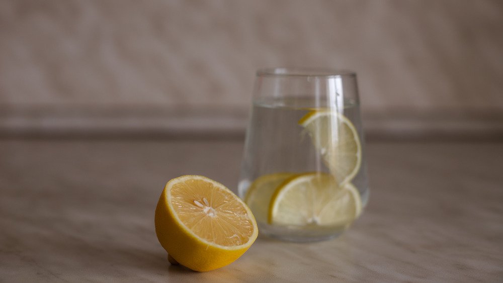 The Real Reason You Should Never Put A Lemon In Your Drink