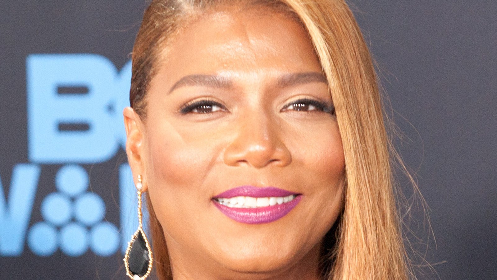 EXCLUSIVE Queen Latifah shows off the butterfly tattoos behind her ear as  she has lunch