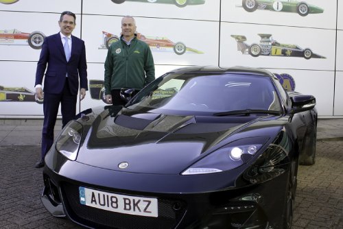 Chapman once again behind the wheel of a Lotus sports car