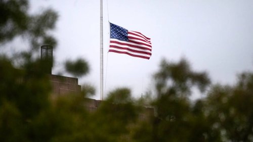 Why are flags at half-staff across Washington state this weekend?