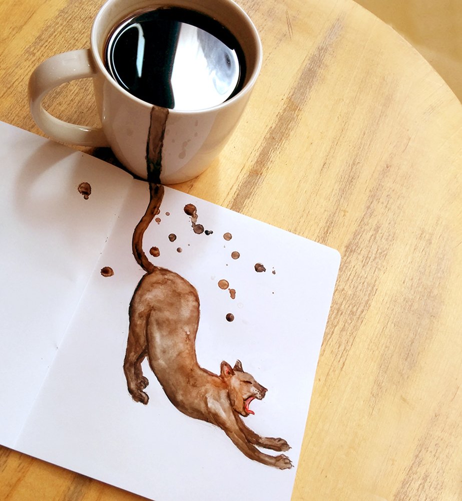 Clever Photos Blend Cats into Coffee Cups