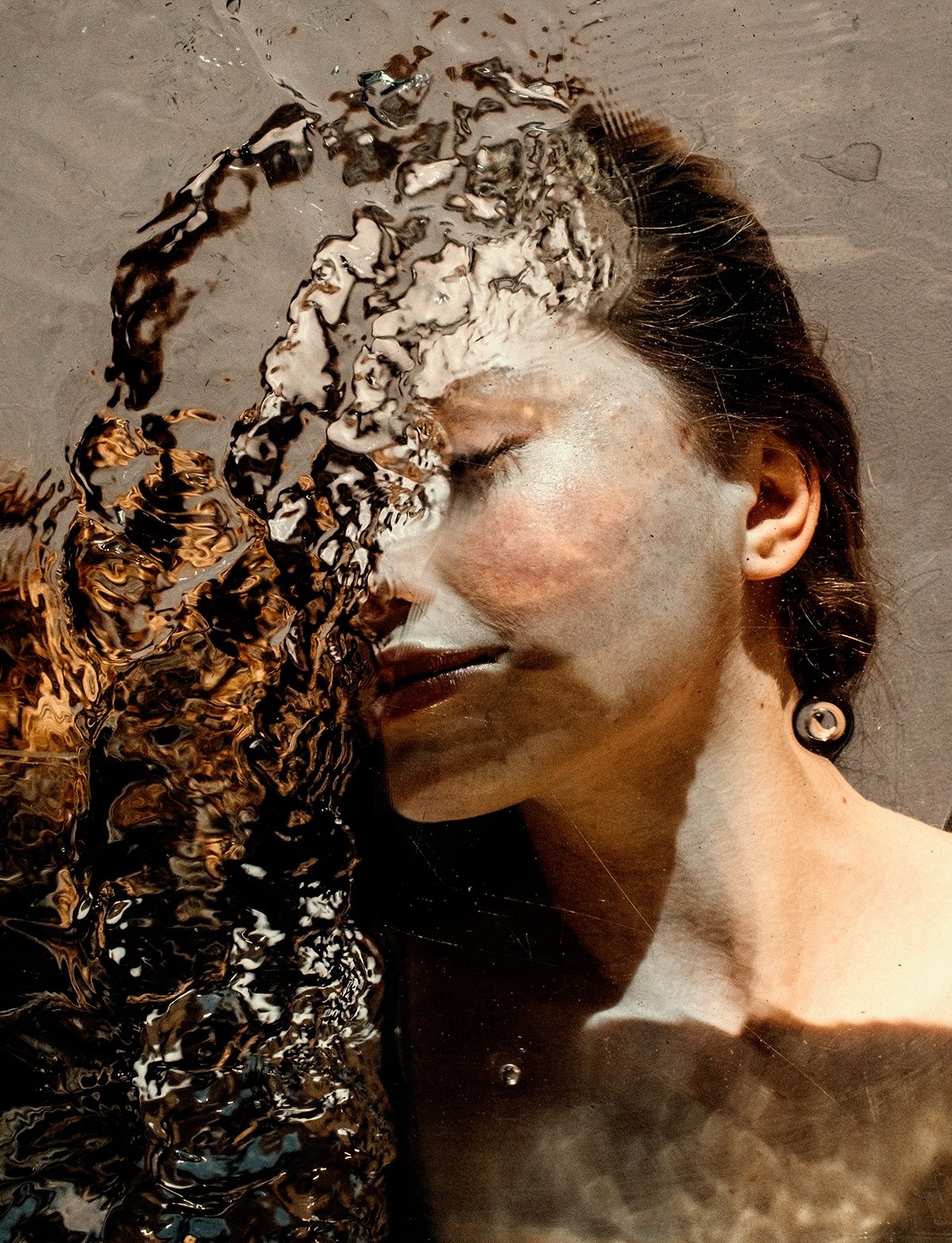 Marta Syrko Uses Water and Glass for Creative Portrait Photography