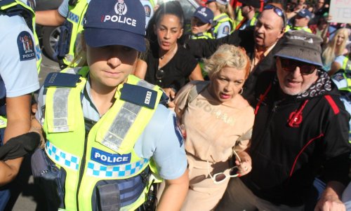 Posie Parker to leave New Zealand after counter-protestors overwhelm anti-trans rally