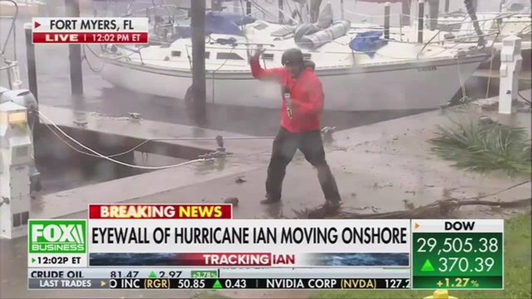 Watch FOX Weather reporter Robert Ray thrown into the field as Hurricane Ian makes landfall in Fort Myers, Florida.