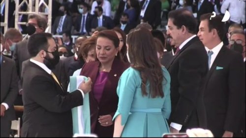 Xiomara Castro is sworn in as Honduras’s first female president with VP Kamala Harris looking on.
