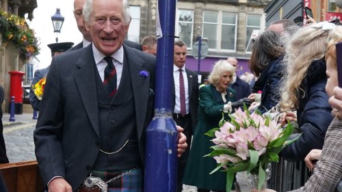 Kilt-wearing King Charles beams as he meets crowds of well-wishers in Scotland