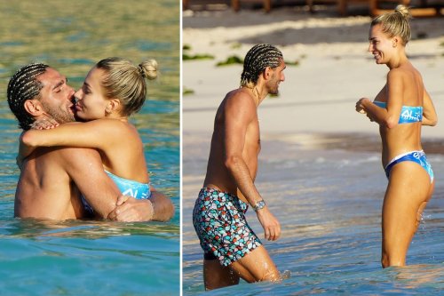 Ex-Man Utd star Fellaini kisses stunning Russian artist Victoria Alex in the sea