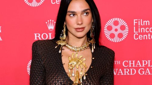 Dua Lipa flashes her thong as she goes braless in sheer dress