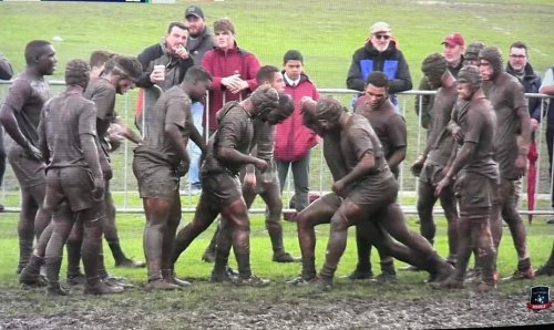 Rugby match or mud fest? Both as school players get drenched in mud