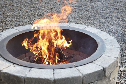 21 Stone Fire Pits to Spark Ideas for Your Outdoor Space
