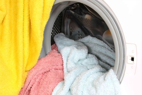 6 Reasons Your Towels Still Smell Bad After You Wash Them, According to Laundry Pros