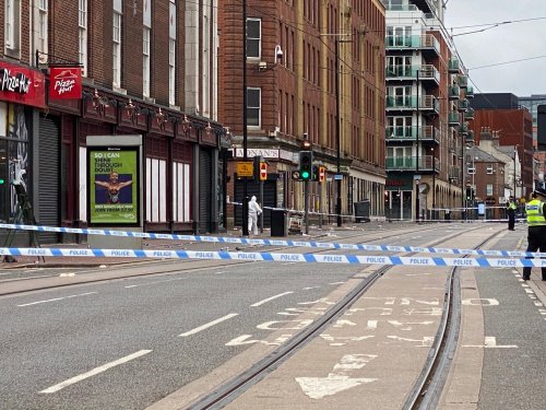 Forensic officers on scene as police tape off road in Sheffield