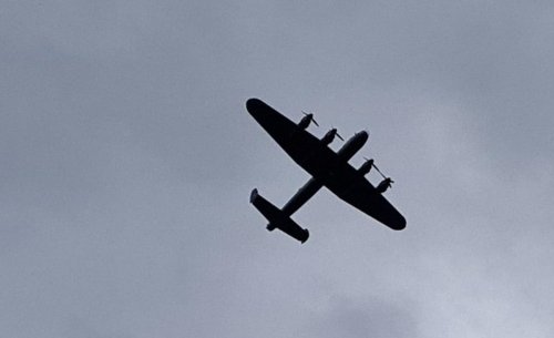 Video shows the moment iconic wartime aircraft flew low over homes in city