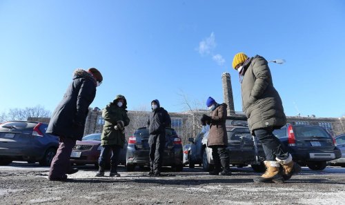 Toronto high school teachers remain in parking lot, refusing to work amid ‘unsafe conditions’ brought on by COVID
