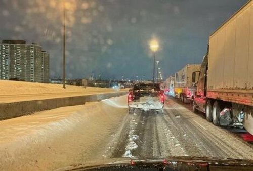Their trip to Pearson airport was supposed to take half an hour. Instead, they spent 6 hours stuck in the snow on the 401