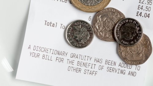 Restaurants and bars are ‘quietly’ introducing new US-style tipping rules and YOU will have to pay extra