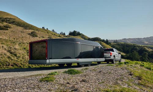 Inside the futuristic 27-ft-long caravan that EXPANDS to sleep six – and it’s made by former Tesla employees