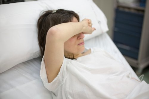 My husband was watching the football when I gave birth but says I'M the a**hole
