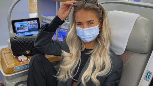 Molly-Mae Hague jets to Dubai with £4,000 of designer luggage as she poses in First Class with boyfriend Tommy Fury
