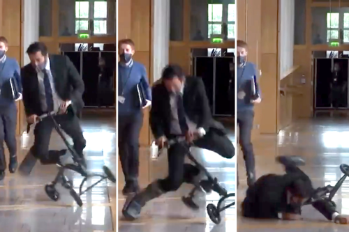 Moment Humza Yousaf falls off scooter while racing through Holyrood