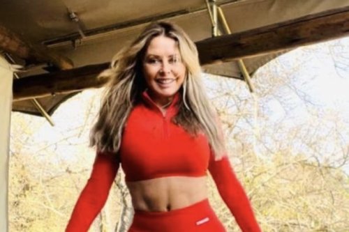 Carol Vorderman looks incredible as she flashes her abs in crop top and skintight leggings